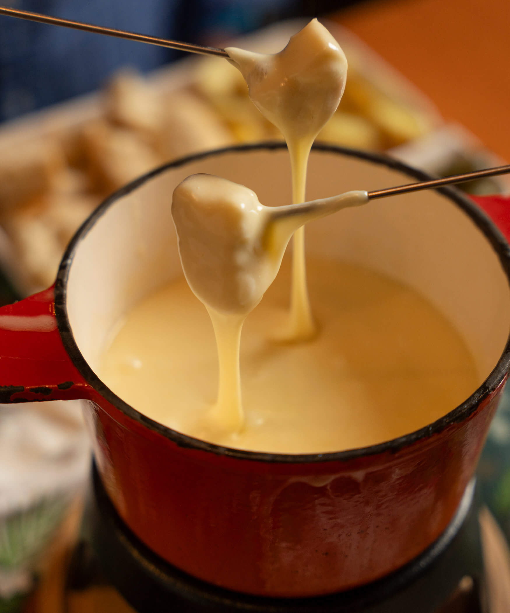 Cheese fondue with two fondue forks