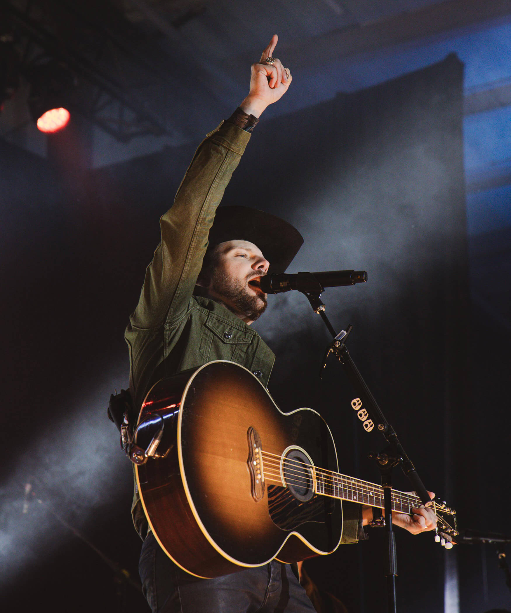 A singer with a guitar in his hand