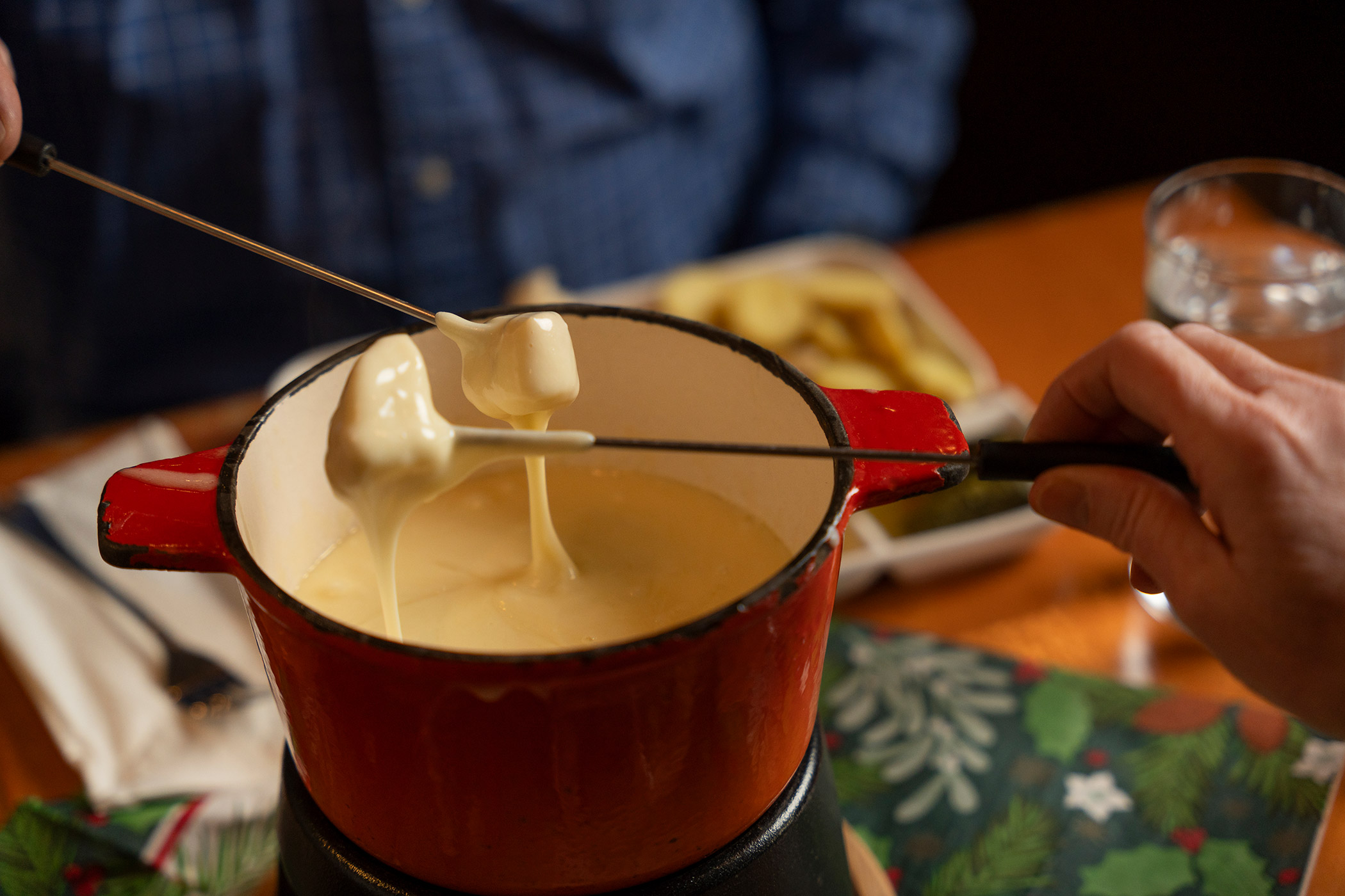 Cheese fondue with two fondue forks