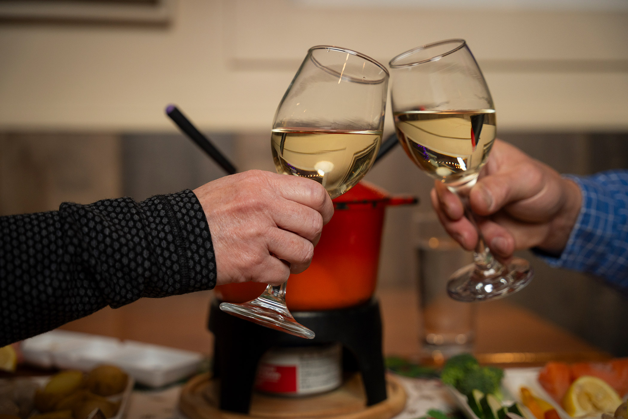 A couple toasts with white wine