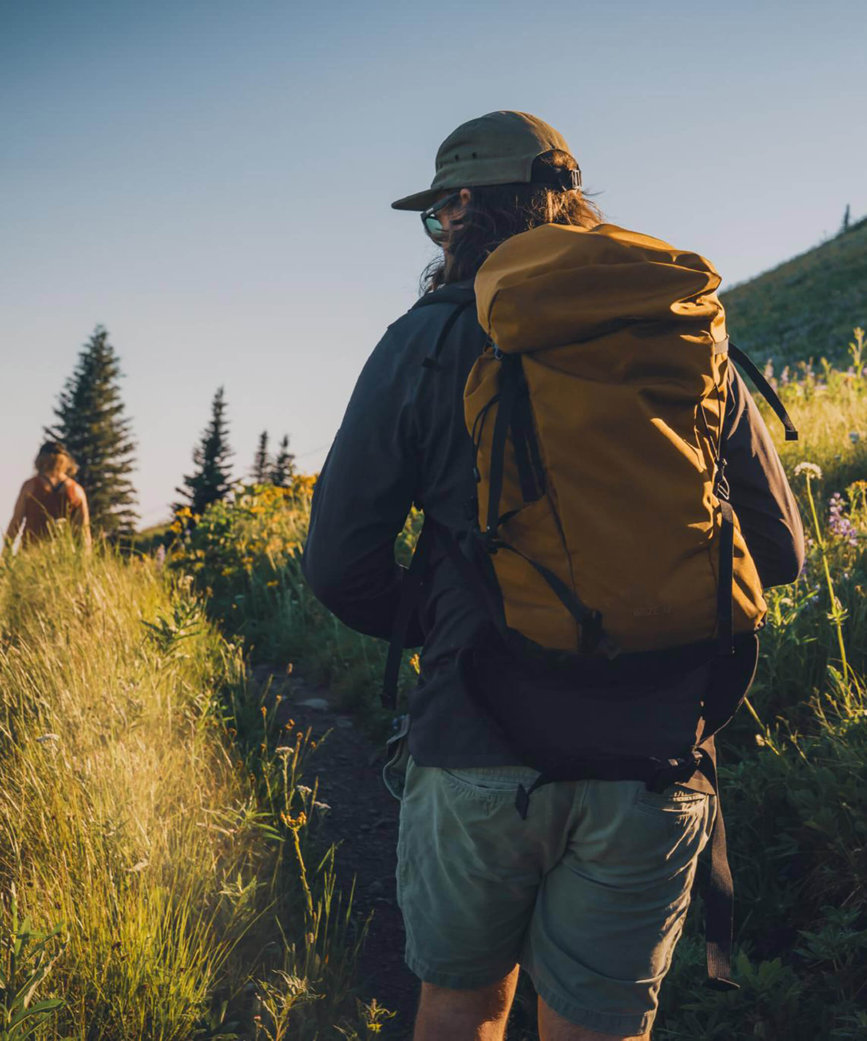 A man with his backpack on his back