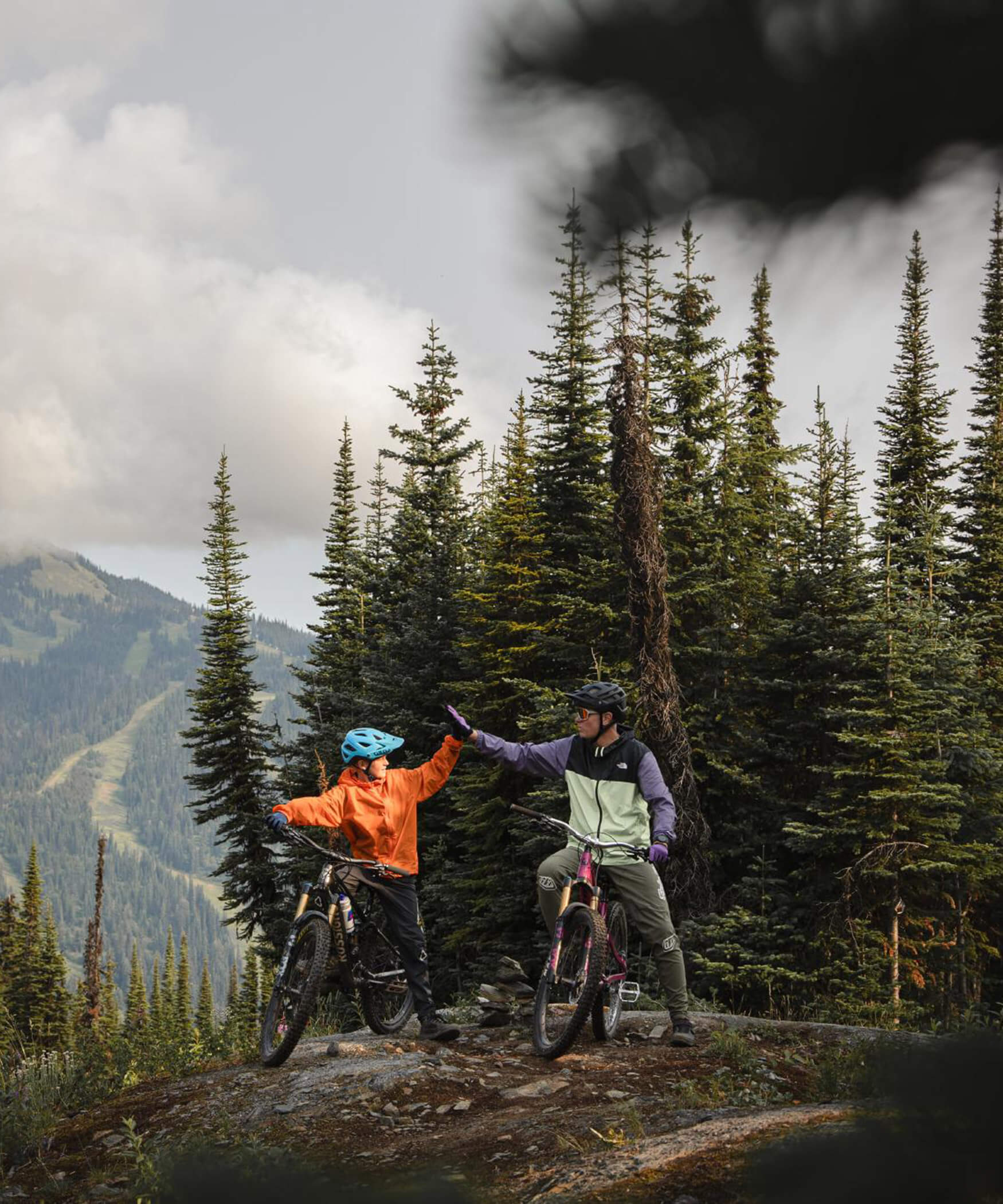 Father and son mountain biking