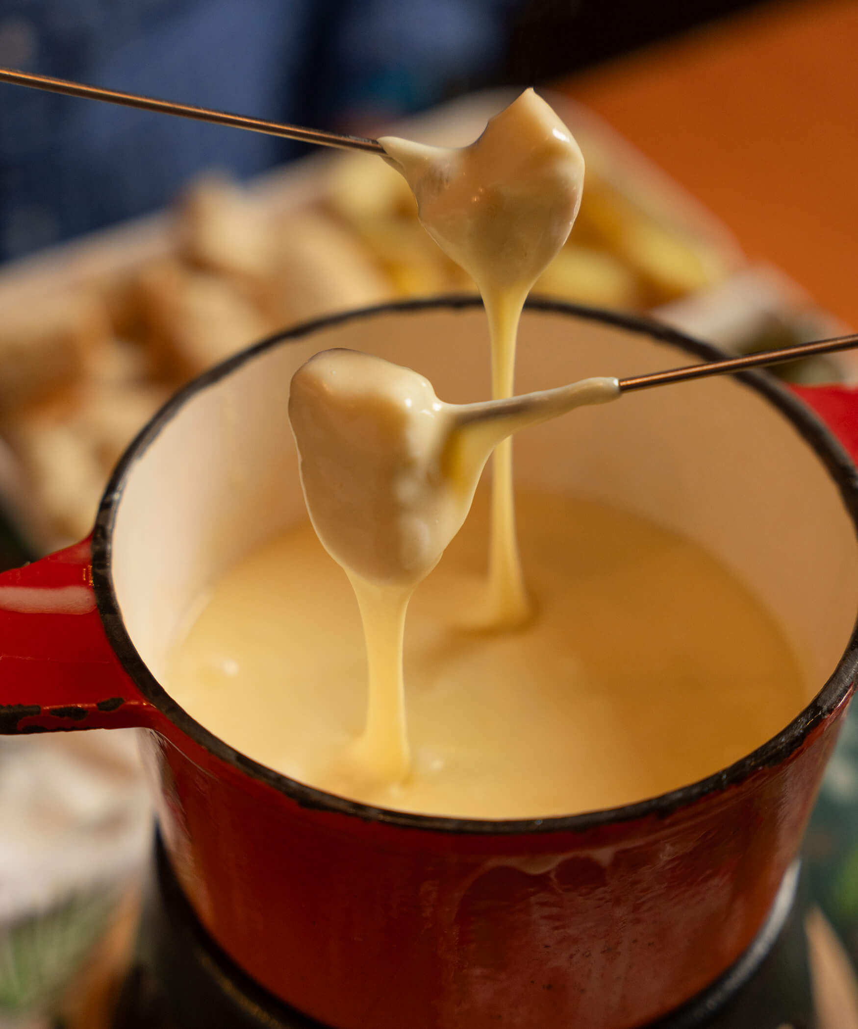Cheese fondue with two fondue forks