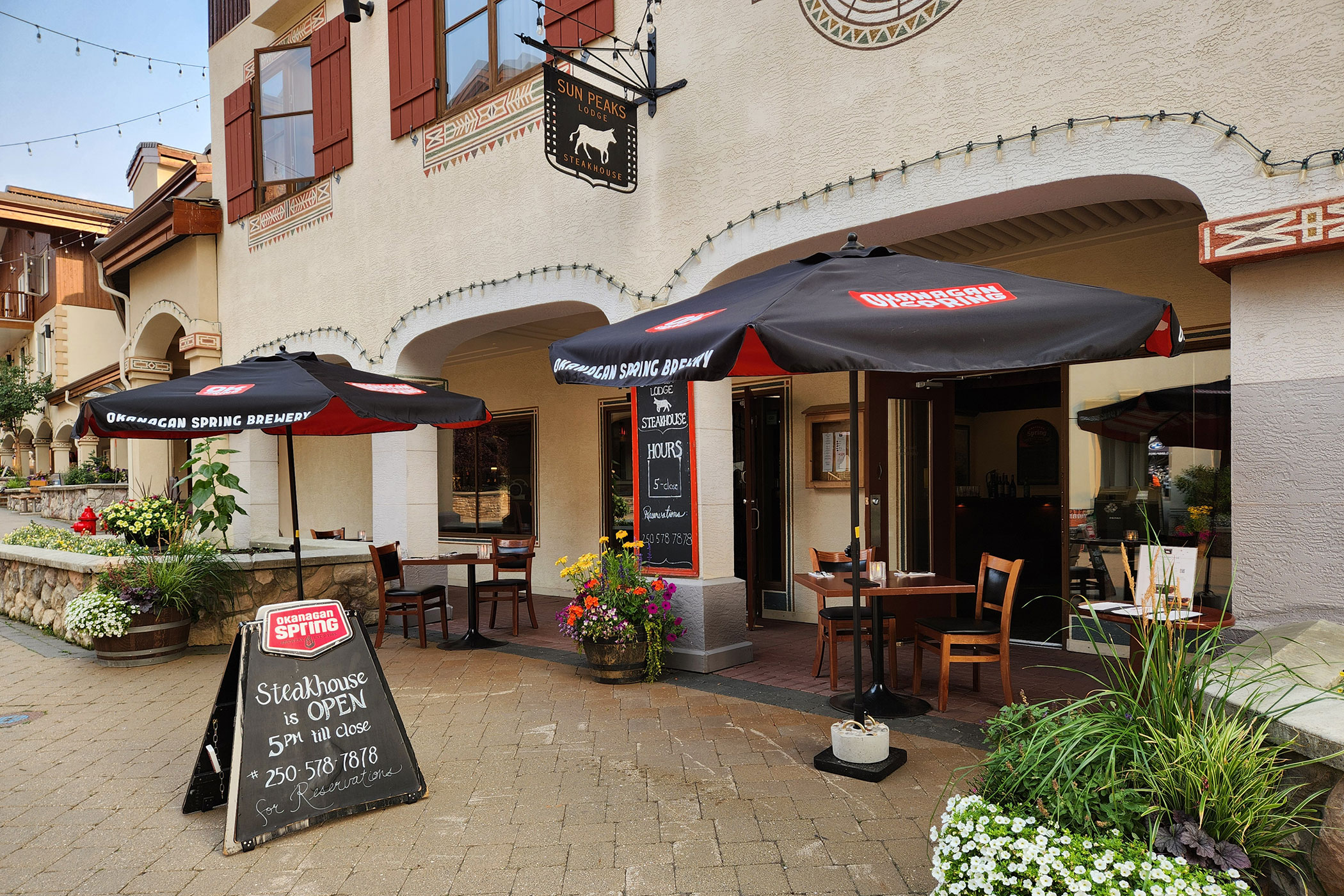 Steakhouse terrace and entrance in summer