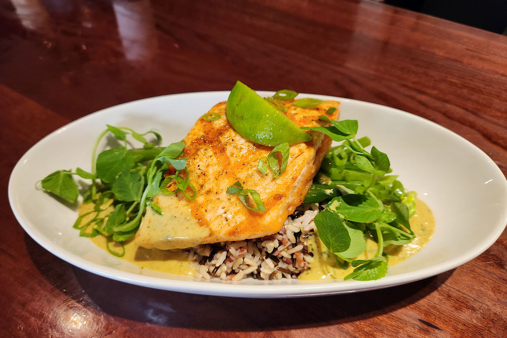 Chicken breast on wild rice with sauce